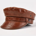 Brown leather cap with a belt on a white background, Obroi