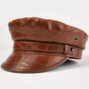Brown leather cap with a belt on a white background, Obroi