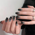 Close-up of hands with gradient gray nail polish on a neutral background, Obroi