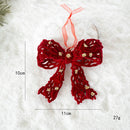 Red decorative bow with gold accents on a white background, showing measurements and weight, Obroi