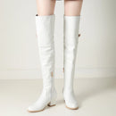 White knee-high boots on a plain background, Obroi