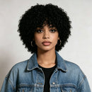 Woman wearing a denim jacket with a plain background, Obroi
