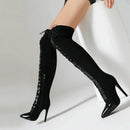 Black over-the-knee boots with decorative elements on a white background, Obroi