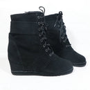 Black wedge boots with laces on a white background, featuring the brand 'Obroi'.