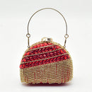 Red handbag with gold accents on a white background, Obroi