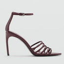 Mauve high-heeled sandal with thin straps on a light gray background, Obroi