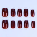 Row of red nail polish on a white background, Obroi