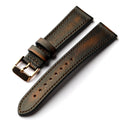 Brown leather watch strap with gold buckle on a white background, Obroi