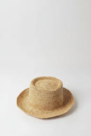 Woven straw hat on a white background, Obroi