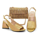 Gold high-heeled shoes and matching handbag on a white background, Obroi