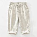 Beige linen pants on a white background, Obroi