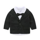Black blazer with white shirt and bow tie on a white background, Obroi