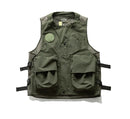 Green tactical vest with multiple pockets and straps on a white background, Obroi