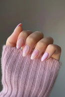 Hand with pink nail polish on a pink textured fabric background, Obroi