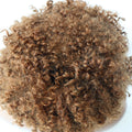 Close-up of a ball of brown yarn on a white background, Obroi
