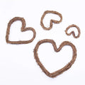 Set of heart-shaped wreaths made from natural materials on a white background, Obroi
