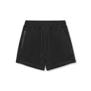 Black shorts with a small logo on a white background, Obroi