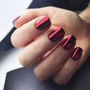 Hand with red nail polish on a blurred background, Obroi
