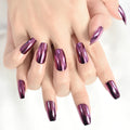 Hand with purple metallic nail polish on a white background, Obroi