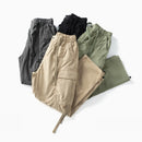 Five pairs of cargo pants in different colors on a white background, Obroi