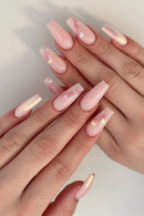 Pink nail art with butterfly and flower designs on a neutral background, Obroi