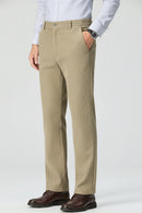 Beige pants worn by a person on a light gray background, Obroi