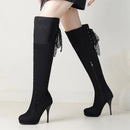 Black knee-high boots with high heels on a white background, Obroi
