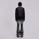 Person wearing a black mesh shirt and dark jeans on a light gray background, Obroi