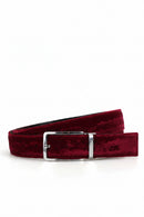 A burgundy velvet belt with a silver buckle, coiled on a white background with the Piergitar brand logo in the top left corner, Obroi
