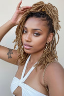 Three brown hair extensions next to a woman with styled dreads, Obroi