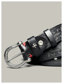 Black leather belt with silver buckle on a light gray background, Obroi