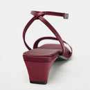 Maroon high-heeled sandal on a white background, Obroi