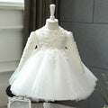 White floral dress on a mannequin against a neutral background, Obroi
