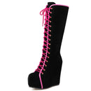 Black knee-high boot with pink laces on a white background, Obroi