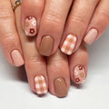 Close-up of hands with a variety of nail designs on a neutral background, Obroi