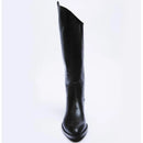 Black knee-high boot on a white background, Obroi