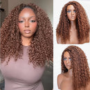 Curly wig with deep brown to copper-brown tones, shown on a model and mannequin against a neutral indoor and studio background, Obroi