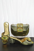 Gold and green shoes with matching handbag on a white background, Obroi