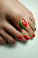 Toes with watermelon-themed nail art on a white background, Obroi
