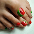 Toes with watermelon-themed nail art on a white background, Obroi