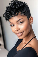 Woman with styled hair in a modern indoor setting, Obroi