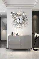 Decorative wall clock with floral design on a wall in a modern interior setting, Obroi