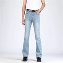 Light blue jeans worn by a person on a white background, Obroi