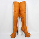 Pair of orange suede over-the-knee high-heeled boots on a white background with 'Obroi' branding.