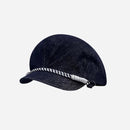 Denim cap with a white braided band on a light gray background, featuring 'Obroi' text.