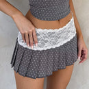 Gray polka dot skirt with lace trim worn by a person on a neutral background, Obroi