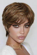 Woman wearing a short, styled wig with a neutral background, Obroi