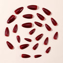 Red nail polish bottles arranged in a circular pattern on a beige background, Obroi