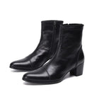 Pair of black leather ankle boots on a white background with 'Obroi' branding.