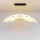 Modern pendant light with a soft glow on a neutral background, Obroi